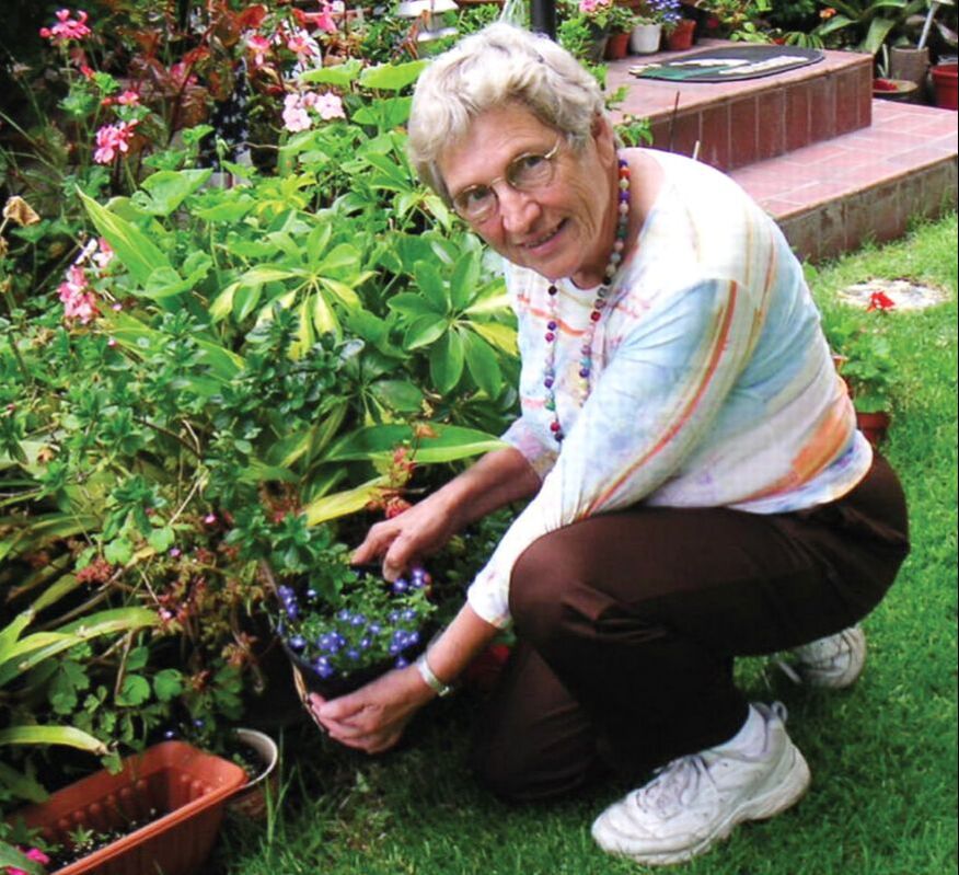 Picture of Bella Schimmel posing in a garden. From https://psychnews.psychiatryonline.org/doi/10.1176/pn.42.16.0014 